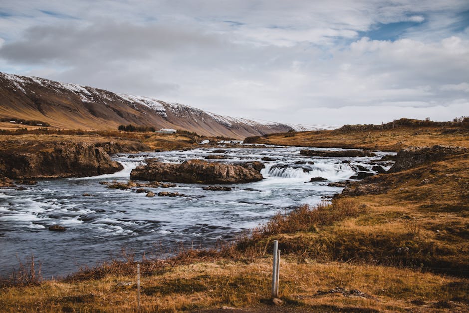 Beautiful Icelandic landscape with a river and mountains in autumn.